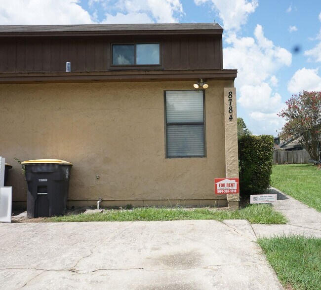 Building Photo - 8784 Whispering Pines Dr