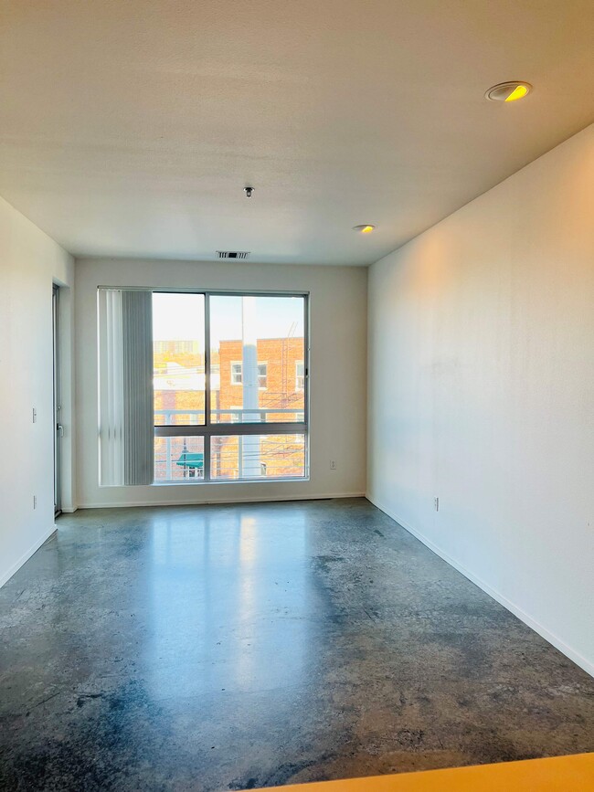 Spacious Living Room with Huge Window View