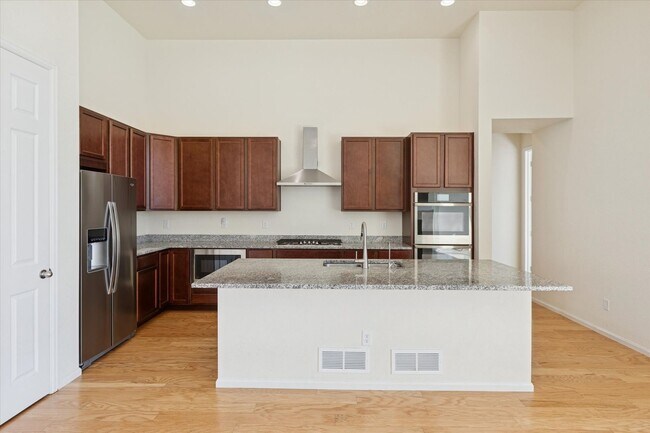 Photo - Modern 4-Bed Ranch in Erie with 13-Ft Ceilings, Solar Panels & EV Charger