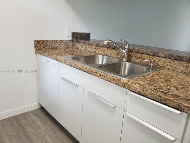 Building Photo - 3238 NW 102nd Terrace Unit 208-F