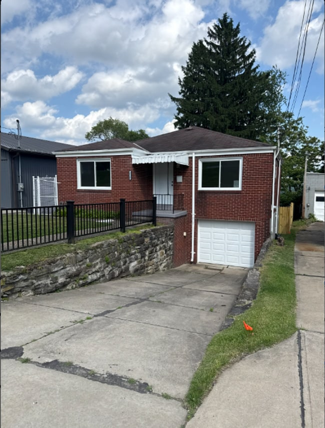 Photo - Adorable 3 Bedroom, 2 Bathroom Home with Garage & Off-Street Parking