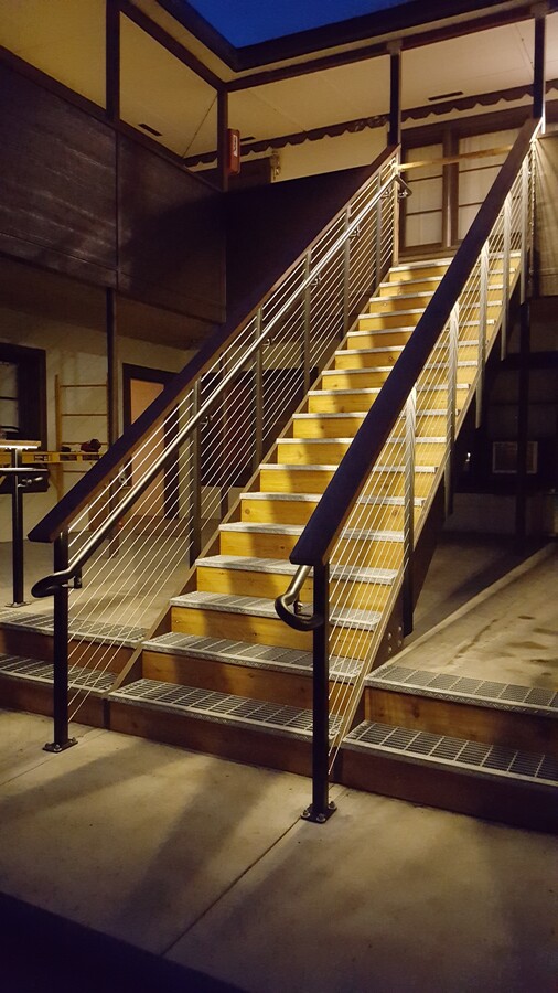 stairs to 2nd floor - 227 Main Ave E Apartments