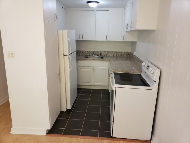 Unit C- View of the kitchen with full size appliances. - 47 -411 Kamehameha Hwy Unit C