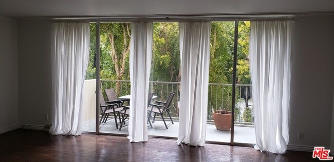 Building Photo - 2170 Century Pk E Unit 307