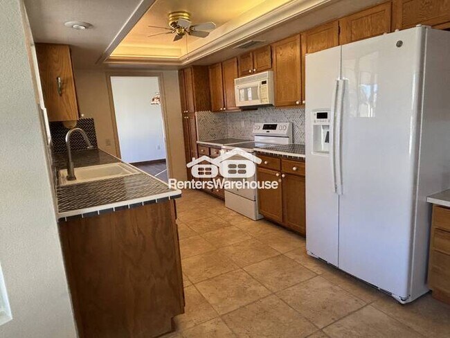 Photo - 3-bedroom, 2-bath home located in a quiet Sun City neighborhood, featuring solar panels for energ...