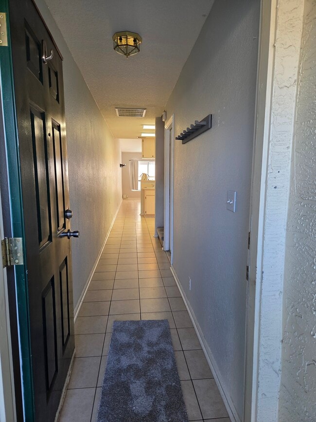 Hallway entrance, garage entrance on right - 682 Green Valley Rd