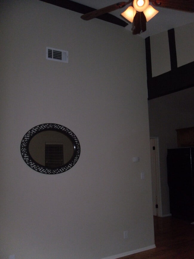 Mirror above new sofa - 7304 Forbes Ave Unit C