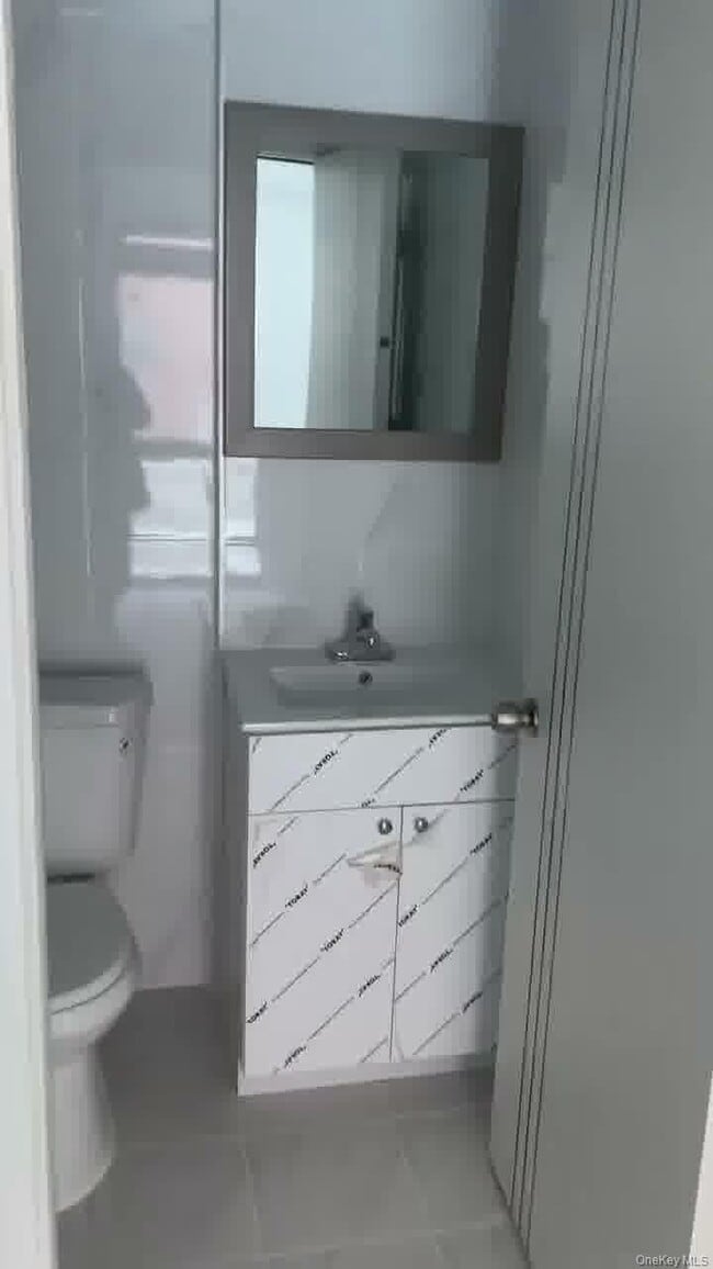 Building Photo - 70-40 45th Ave Unit 2J