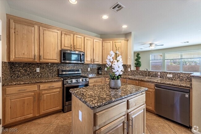 Building Photo - 9561 Rolling Thunder Ave Rental