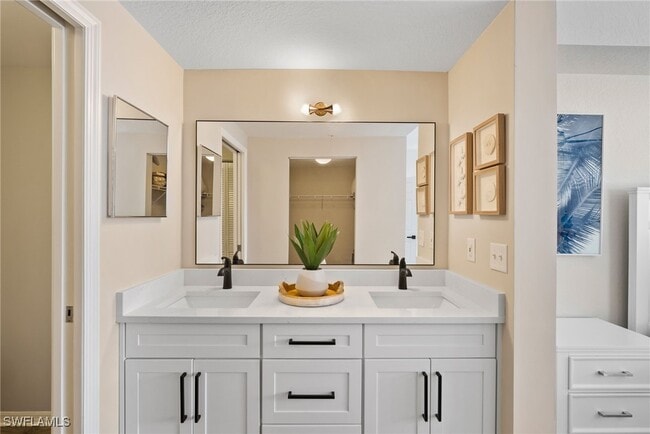 Building Photo - 22748 Island Pines Way Unit 403