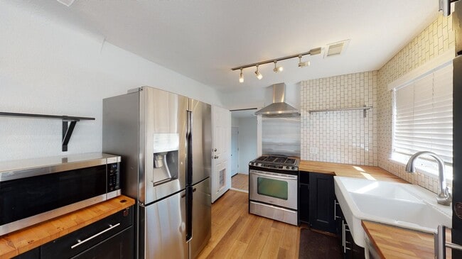 Photo - Bright & beautiful South Park Hill duplex property with large fenced shared yard