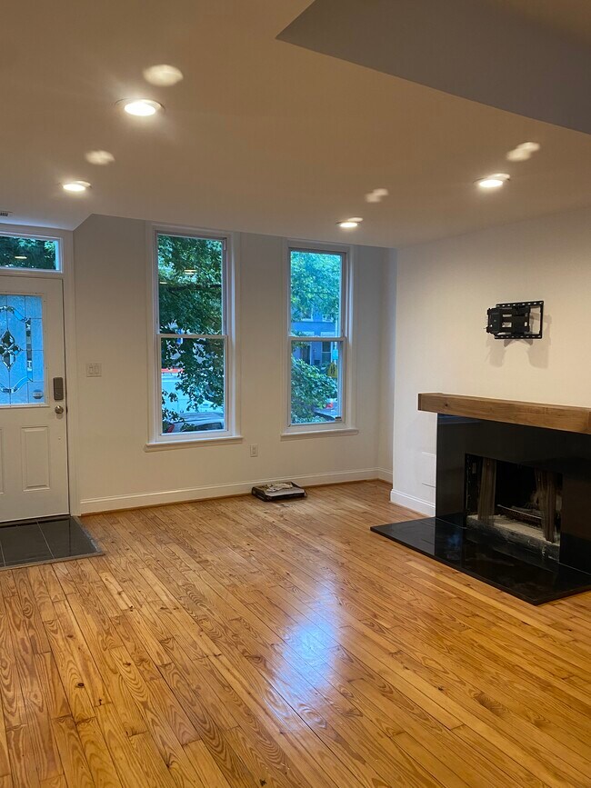 Living room with fireplace - 112 15th St SE Unit A