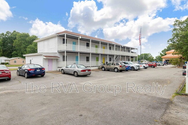 Building Photo - 3807 Woodlawn St Unit 1