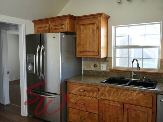 Photo - Good looking 3 bedroom 2 bath with huge yard!