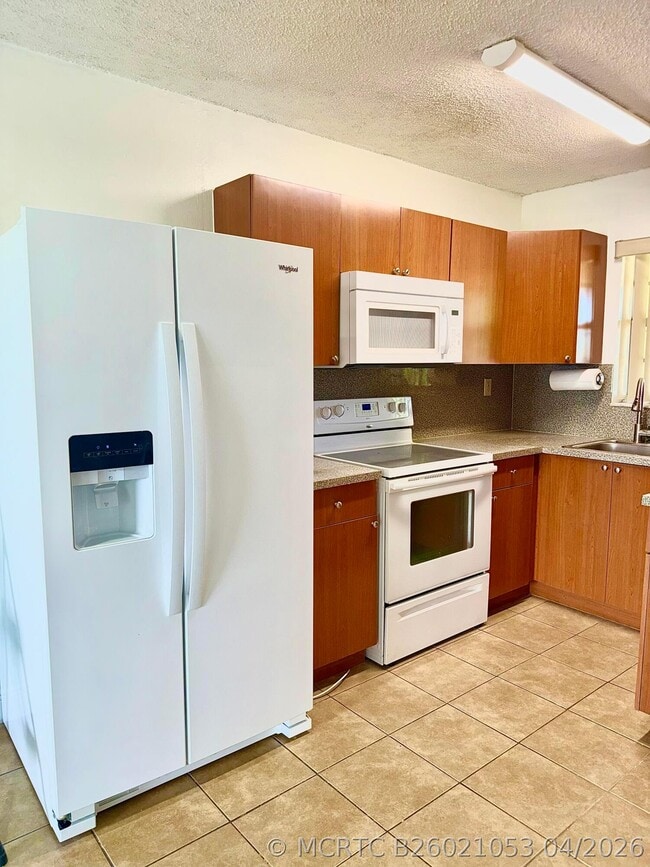 Building Photo - 4050 NW 135th St Unit 22-1