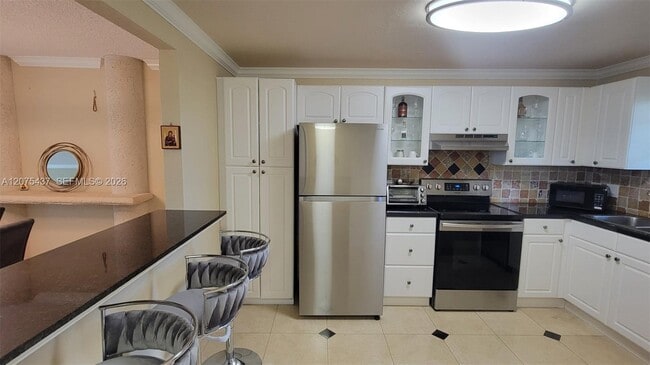 Building Photo - 2410 Deer Creek Country Club Blvd Unit 310E