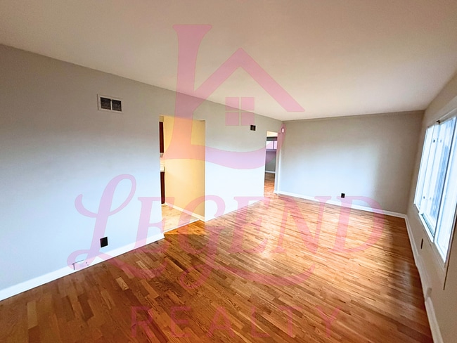 Photo - Charming 3-Bedroom Home with Hardwood Floors, Updates & Fenced Yard.