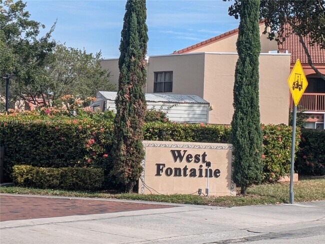 Building Photo - 10245 NW 9th St Unit 210-9 Rental