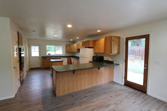 Photo - COMING AUGUST | 3-Bedroom Home in Bow & Arrow Acres | Large Yard + Wood-Burning Fireplace