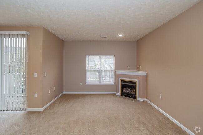 2 habitaciones, 2 baños - 1281 pies cuadrados - Sala de estar - Units within Foxmoor Condominiums