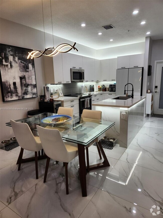 Building Photo - 8363 NW 41st St Unit A-105 Rental