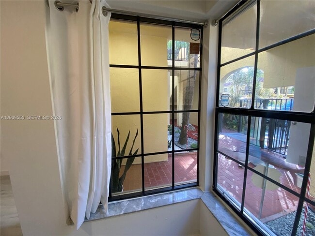 Building Photo - 8807 SW 130th Pl Unit 102