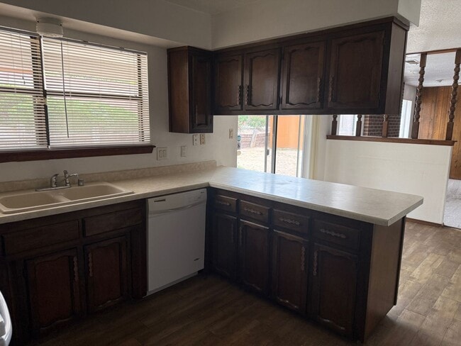 Photo - 4 Br, 1.75 Ba, 2 living areas, formal dining room, 2 CG, nice yards, storage shed