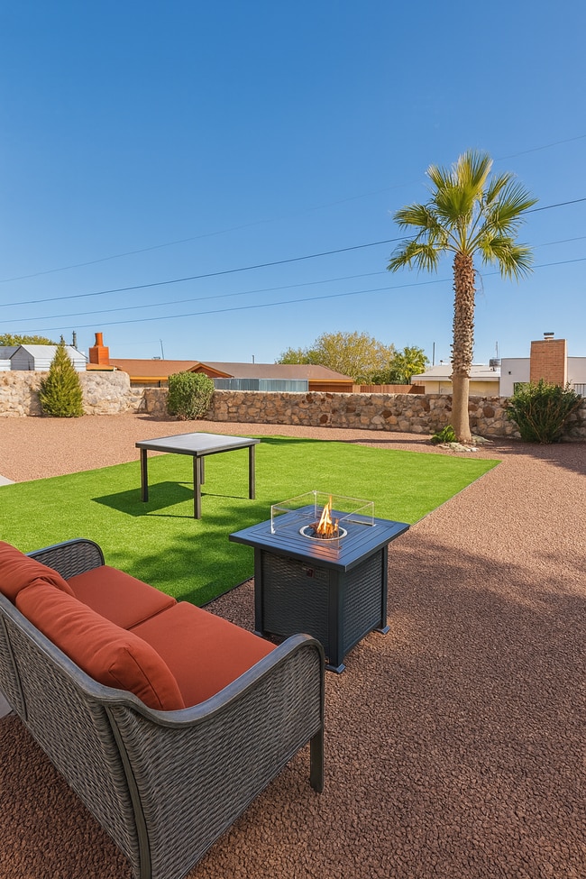 Large backyard with turf and gravel—clean, low-maintenance, and private. - 10116 Mercedes St