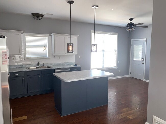 Photo - Rare home on the island! Large fenced in back yard! Pets are allowed. Owner will manage.