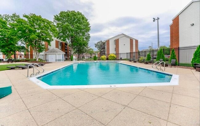 Photo - Welcome to Hampton Club – a gated community offering comfort, convenience, and peace of mind! Unit 4