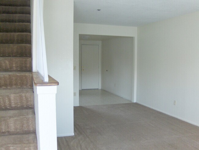 Entry view of Living Room and Kitchen