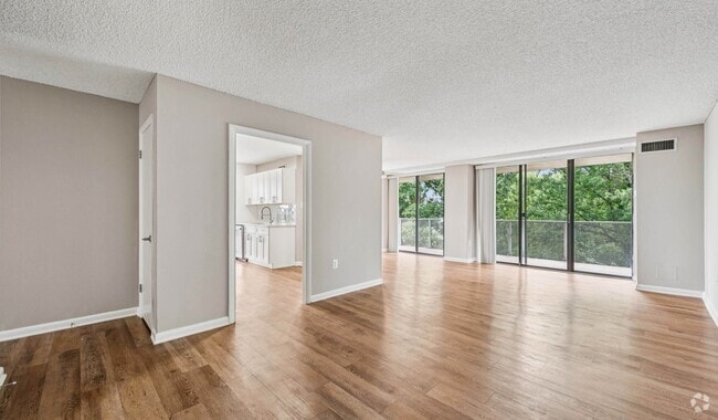 Open concept layout with spacious living room - The Summit Rental