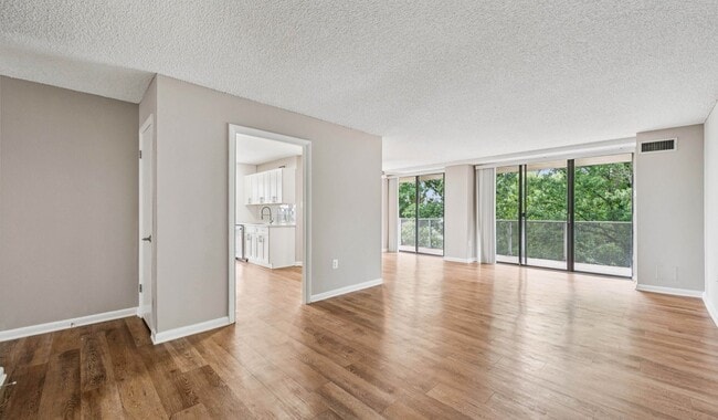 Open concept layout with spacious living room - The Summit Rental