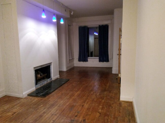 Living room with wood-burning fireplace - 1438 Harvard Street, NW
