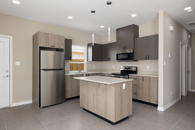 Building Photo - 5809 Puffin Ave Unit 1