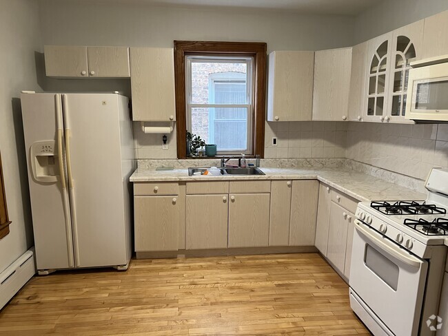 Building Photo - 5353 W Newport Ave Unit 1st floor Rental
