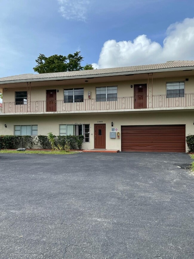 Building Photo - 11440 NW 39th St Unit 1