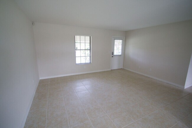Photo - Waterfront 3BR Home on Canal | Spacious Yard | Lawn Care Included | Pet Friendly