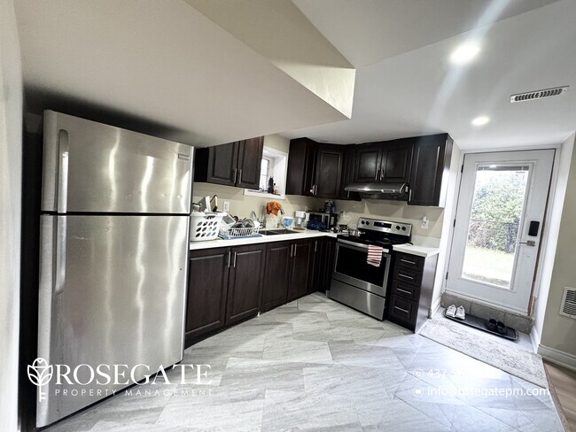 Photo - Spacious 3-Bedroom + Den Walk-Out Basement... Unit 2