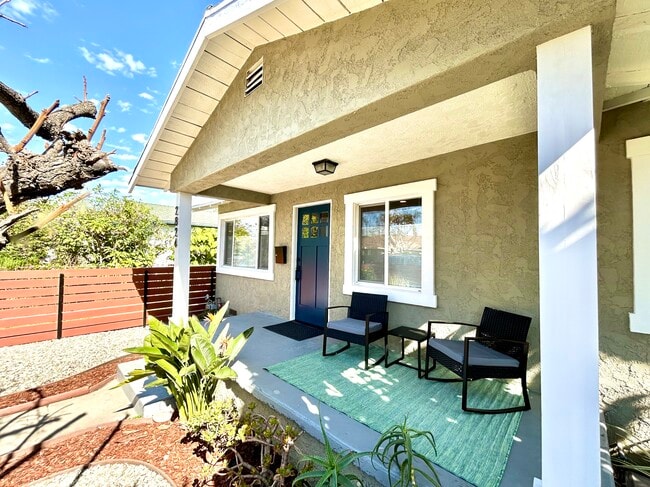 The front porch with rocking chairs - 2824 S Orange Dr