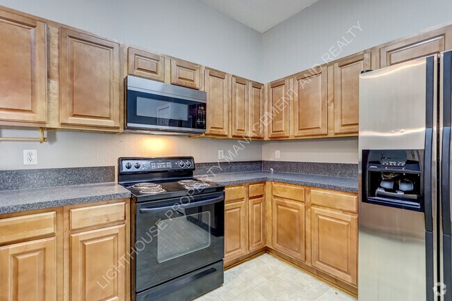 Building Photo - 6788 Manotak Oaks Dr Unit 107 Rental