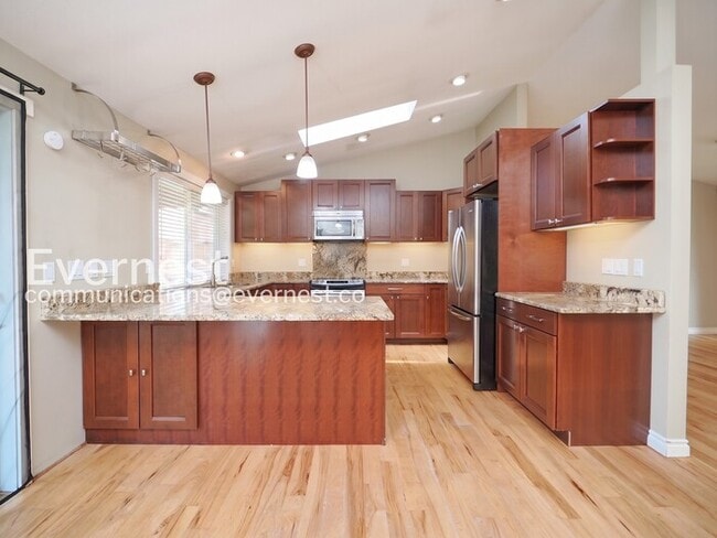 Photo - 3 Bed, 2 Bath Home with Fenced Yard & Garage / Available Soon!