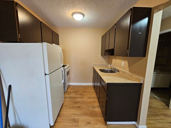 Building Photo - 33924 George Ferguson Way Unit 305