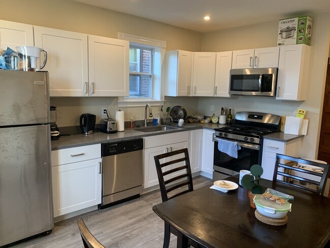 Building Photo - NO BROKER FEE | Renovated 4 Bed, 2 Bath with In-Unit Laundry | Mission Hill