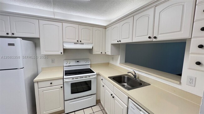 Photo - 1290 S Military Trail Unit 416