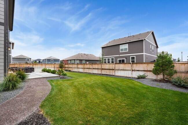 Photo - Updated 3-Bedroom Home With 3-Car Garage Close to Commuting, Coffee, and Gym