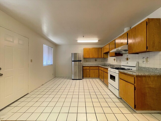 Photo - A clean and well-maintained 3-bed, 2-bath home located in the vibrant Laurel District. Unit Apt 7
