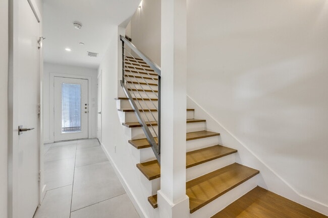 Photo - Live Above It All | Sleek Multi-Level Condo with Private Rooftop Deck