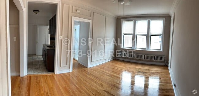 Building Photo - 1371 W Estes Ave Unit 1F Rental