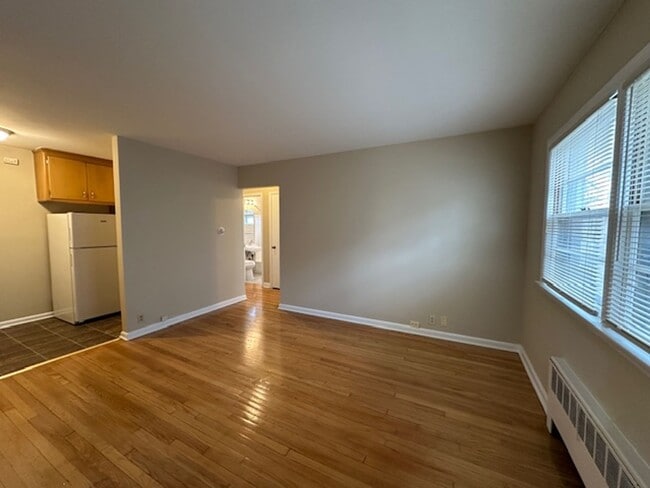 Photo - Cozy 1BR in Riverwest $895 – Heat Included | Hardwood Floors | Storage + Laundry